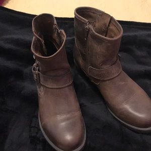 Distressed brown boots